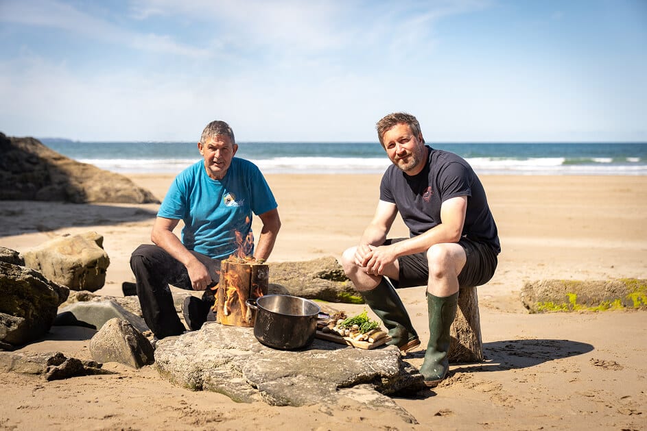 Anthony and Craig cooking some food on the beach