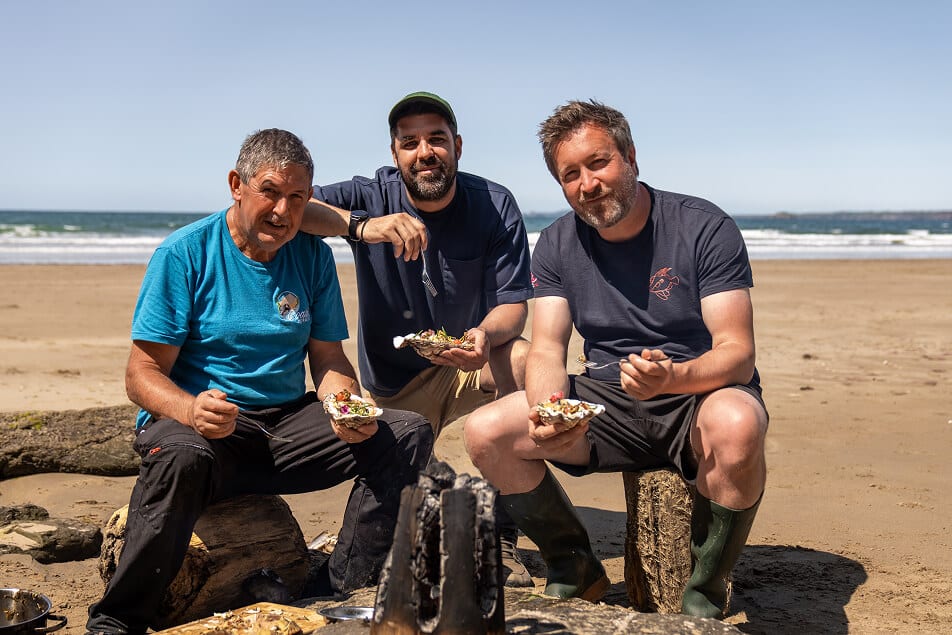 Anthony, Craig and Dan enjoying some food on the beach