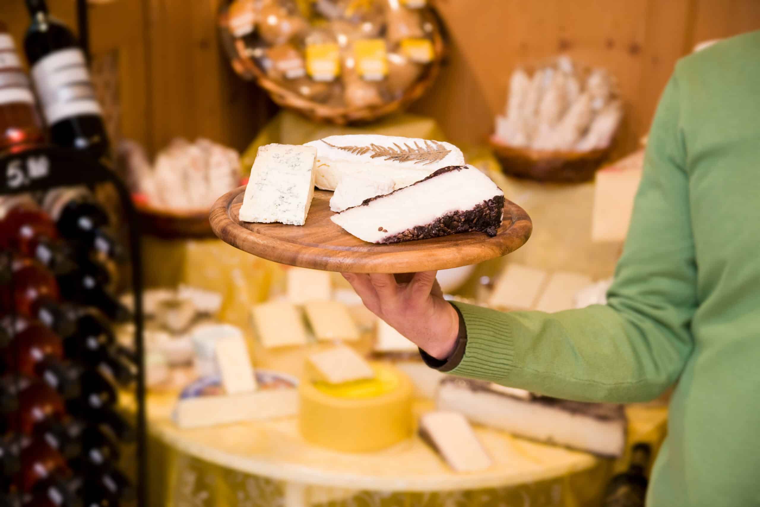 cheese, wine store owner in shop