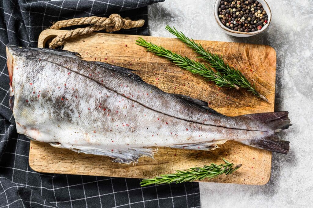 fresh-haddock-fish-carcass-on-the-cutting-board